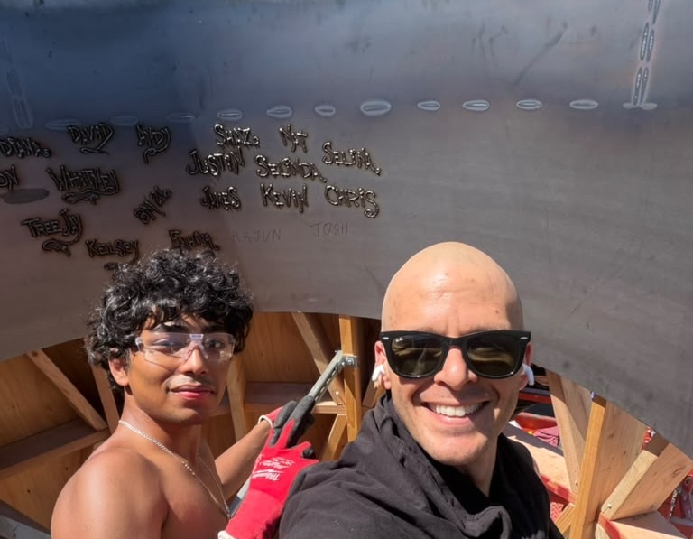 Signing names on the tower steel